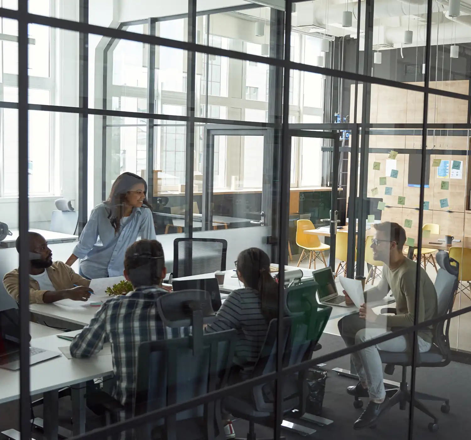 Professional team meeting in modern conference room for audit consultation